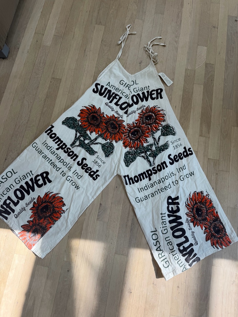 Kathmandu Sunflower Print Wide-Leg Jumpsuit - White with Orange Floral